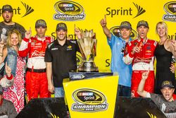 Race winner and 2014 NASCAR Sprint Cup series champion Kevin Harvick, Stewart-Haas Racing Chevrolet celebrates with crew chief Rodney Childers, Tony Stewart, DeLana Harvick and Gene Haas