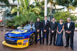 NASCAR Nationwide Series champion driver Chase Elliott with owners Dale Earnhardt Jr., Kelley Earnhardt, Rick Hendrick, crew chief Greg Ives