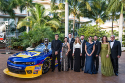 NASCAR Nationwide Series champion driver Chase Elliott with owners Dale Earnhardt Jr., Kelley Earnhardt, Rick Hendrick, crew chief Greg Ives