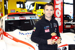 Romain Dumas with the Buggy he will drive in the 2015 Dakar Rally