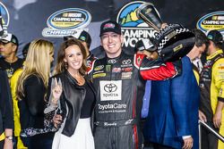 Championship victory lane: NASCAR Camping World Truck Series 2014 champion owner Kyle Busch with wife Samantha