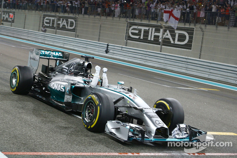 Lewis Hamilton, Mercedes AMG F1 crosses the finish line to win and take 2014 World Championship