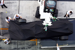 The McLaren MP4-29 of Stoffel Vandoorne, McLaren Test and Reserve Driver is recovered back to the pits on the back of a truck