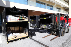 The teams pack their freight in the paddock at the end of the season