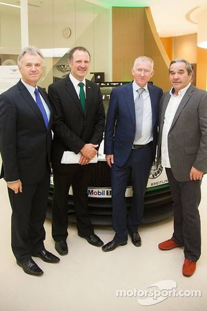 Brian Gush, Bentley Director of Motorsport, and Norbert Brückner, HTP Motorsport Team Principal with other officials pose for a photo as announces HTP Motorsport to run the Bentley Continental GT3 in 2015