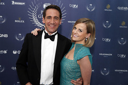 Susie Wolff poses with a colleague at the FIA prize giving gala