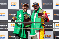 General podium: race winner Abdulaziz Al Faisal celebrates with Mohammed Jawa