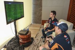 Dani Pedrosa and Marc Marquez, Repsol Honda Team play video games