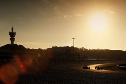 (L to R): Daniil Kvyat, Red Bull Racing RB11 and Lewis Hamilton, Mercedes AMG F1 W06