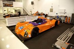 Various 8Star Motorsports cars in the team's workshops