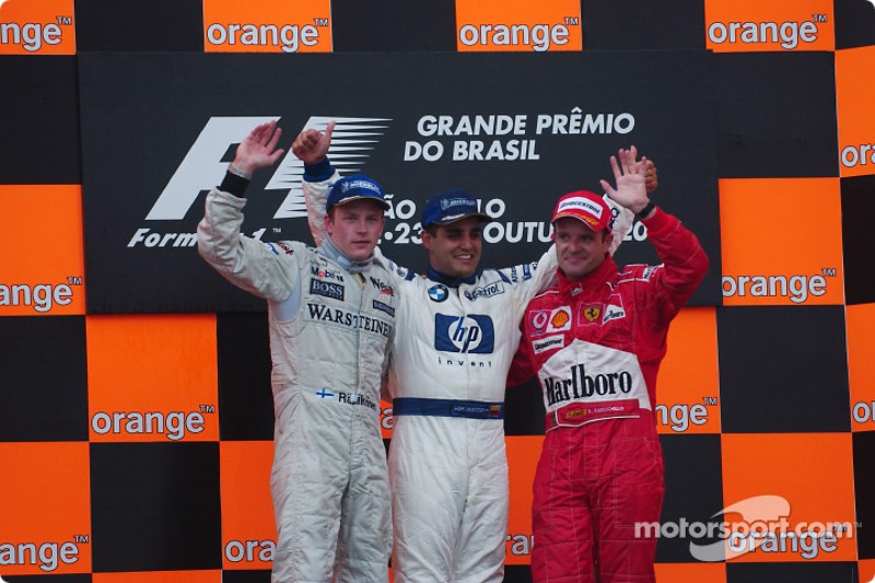 Podio: gandor de la carreraJuan Pablo Montoya con Kimi Raikkonen y Rubens Barrichello