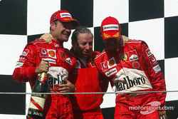 Podium: Rubens Barrichello, Jean Todt and Michael Schumacher celebrate