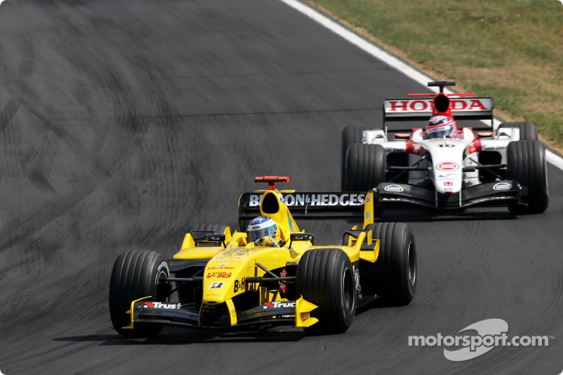 Nick Heidfeld and Takuma Sato