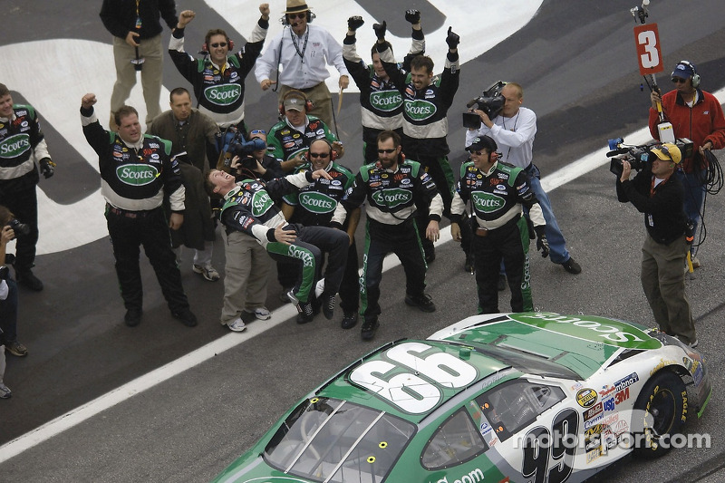 Race winner Carl Edwards does his traditional victory back flip