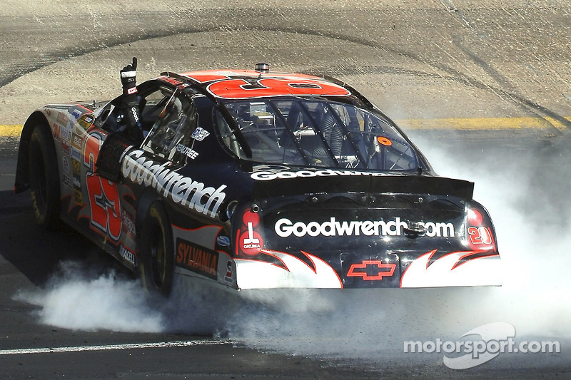 Race winner Kevin Harvick celebrates with a burnout