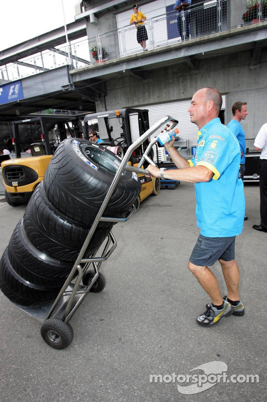 Renault team members pack up during the race