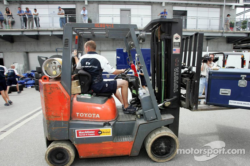 Teams pack up before the end of the race