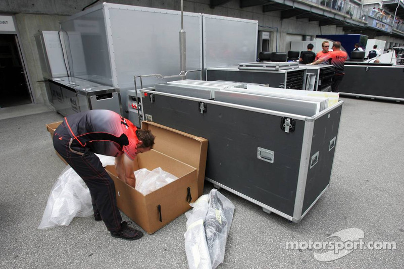 Teams pack up before the end of the race