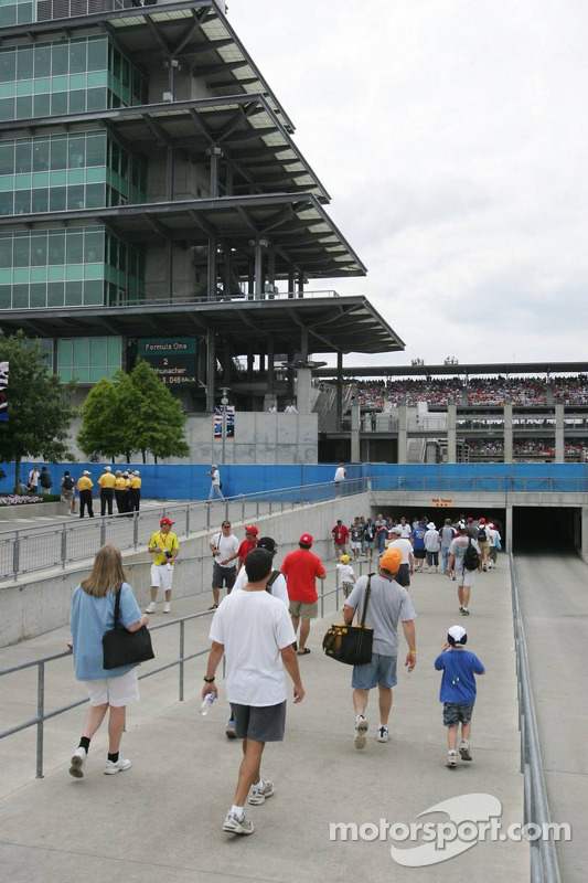 Fans leave the track before the end of the race