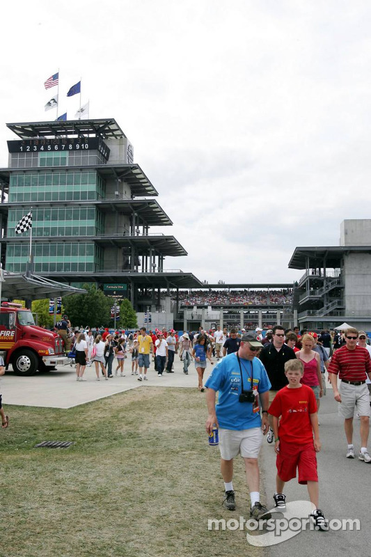 Fans leave the track before the end of the race