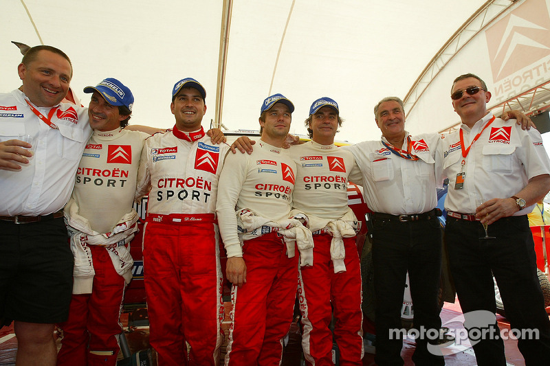 Winners Sébastien Loeb and Daniel Elena celebrate with Carlos Sainz and Marc Marti and Citroën Sport