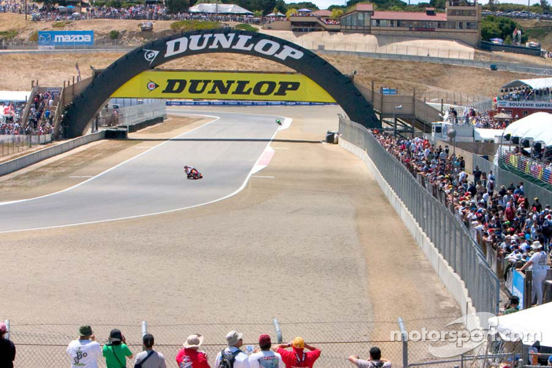 The crowds were thick along the fences, here watching Nicky Hayden at Turn 4