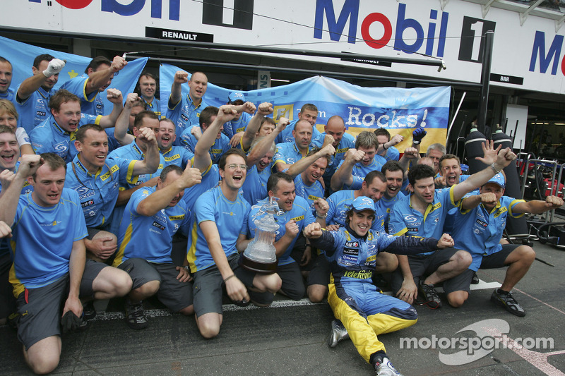 Race winner Fernando Alonso celebrates with Renault F1 team members