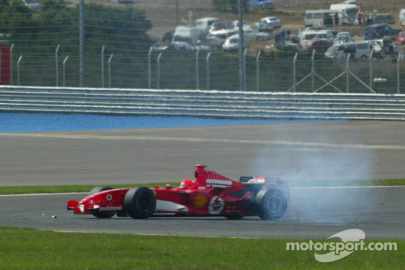 Kazanın ardından Michael Schumacher ve Mark Webber