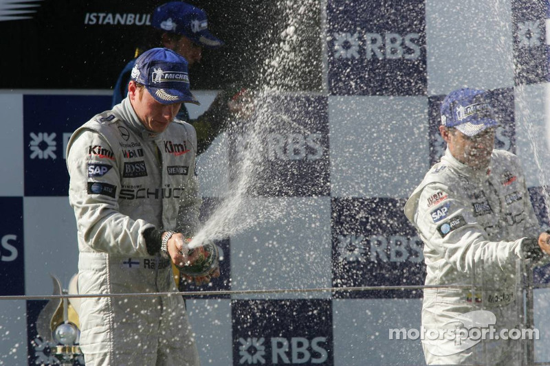 Podium: champagne for Kimi Raikkonen, Fernando Alonso and Juan Pablo Montoya