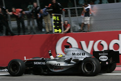 Race winner Juan Pablo Montoya celebrates