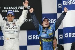 Podium: race winner Juan Pablo Montoya and 2005 World Champion Fernando Alonso celebrate