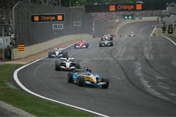 Fernando Alonso leads Juan Pablo Montoya