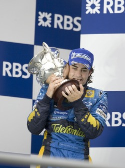 Podium: 2005 World Champion Fernando Alonso celebrates