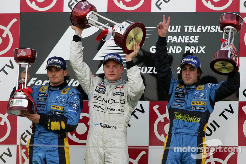 Podium: race winner Kimi Raikkonen with Giancarlo Fisichella and Fernando Alonso