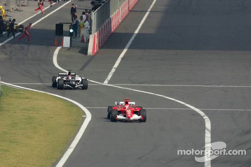 Michael Schumacher and Christijan Albers start the race from pitlane