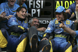 Giancarlo Fisichella, Flavio Briatore and Fernando Alonso celebrate world championship