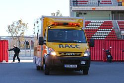 Fernando Alonso, McLaren is brought to the paddock area in an ambulance