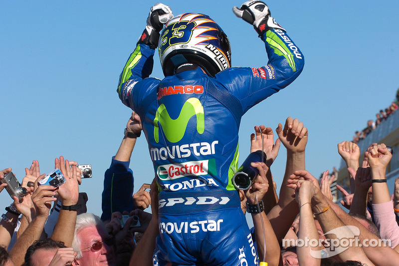 Race winner Marco Melandri celebrates
