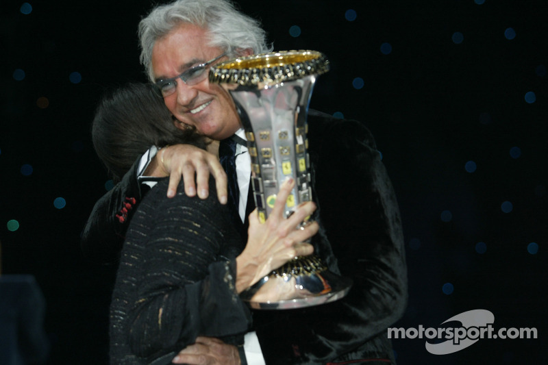 Patrizia Spinelli and Flavio Briatore celebrate Formula One constructors championship