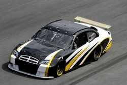 NASCAR test driver Brett Bodine, drives the NASCAR car of tomorrow with a rear wing