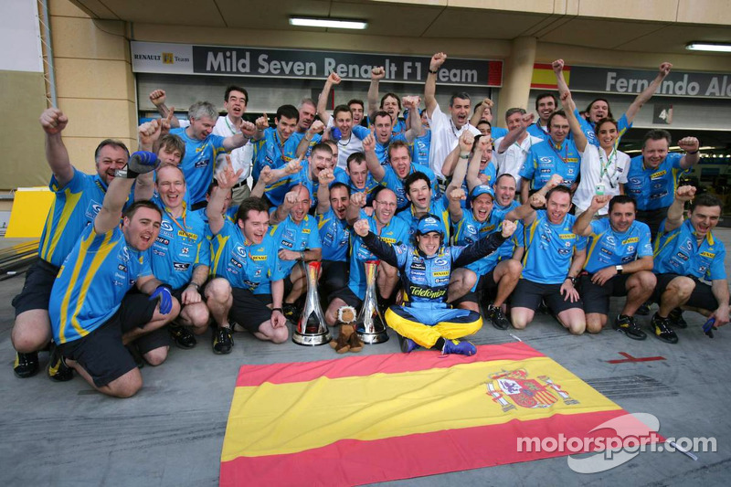 Race winner Fernando Alonso celebrates with Renault F1 team members