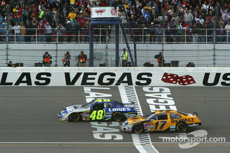 Jimmie Johnson edges Matt Kenseth to take the checkered flag