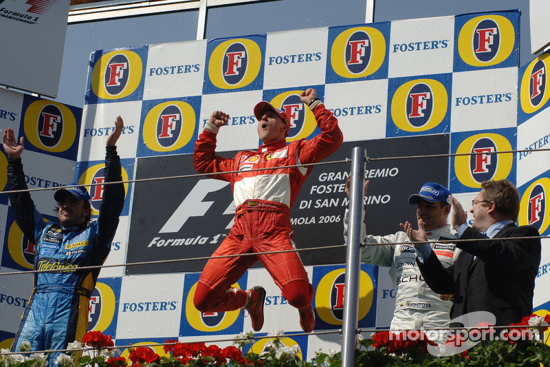 Podium: race winner Michael Schumacher with Fernando Alonso and Juan Pablo Montoya