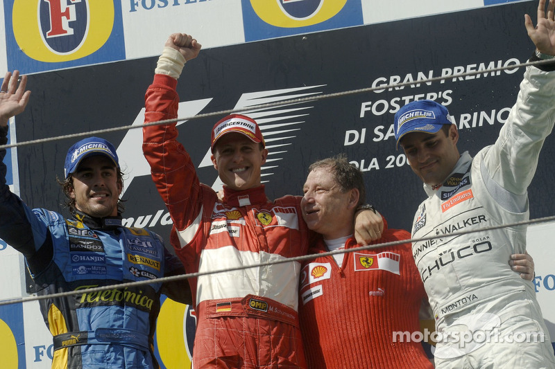 Podium: le vainqueur de la course Michael Schumacher avec Fernando Alonso, Jean Todt et Juan Pablo Montoya