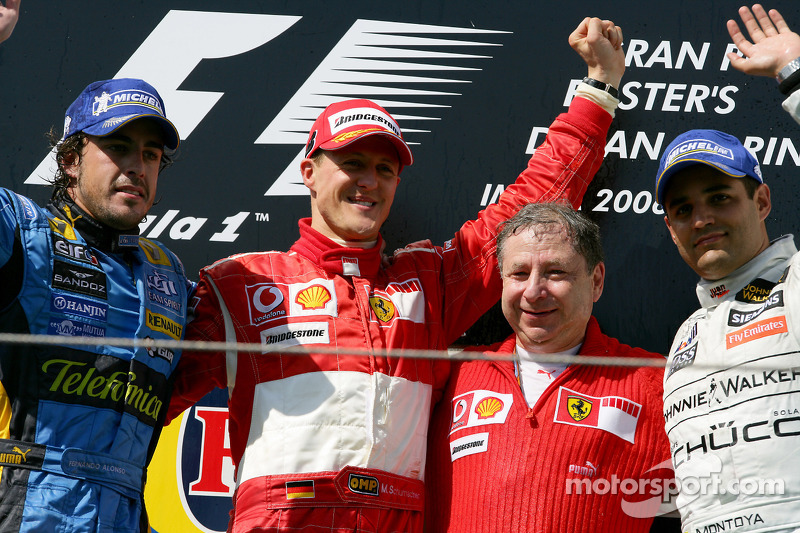 Podium: le vainqueur de la course Michael Schumacher avec Fernando Alonso, Jean Todt et Juan Pablo Montoya