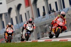 Marco Melandri, Gresini Honda; Casey Stoner, LCR Honda; Dani Pedrosa, Repsol Honda