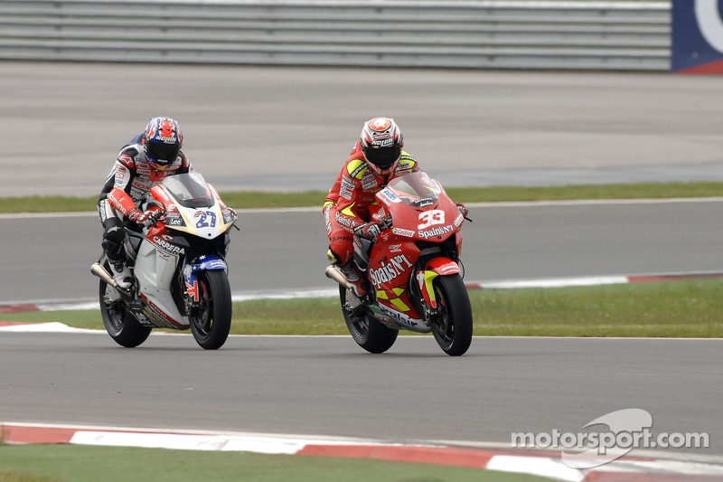 Marco Melandri, Gresini Honda; Casey Stoner, LCR Honda