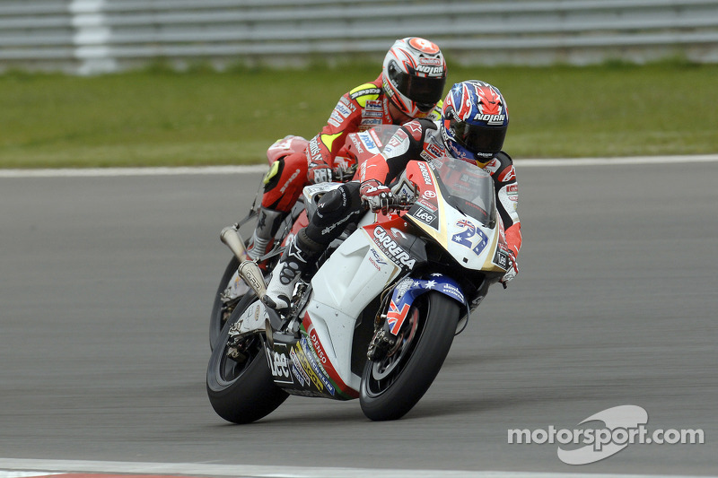 Casey Stoner, LCR Honda; Marco Melandri, Gresini Honda