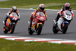 Casey Stoner, Marco Melandri and Dani Pedrosa battle