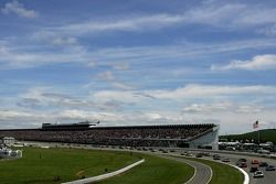 The field heads out of turn three as they begin to start racing